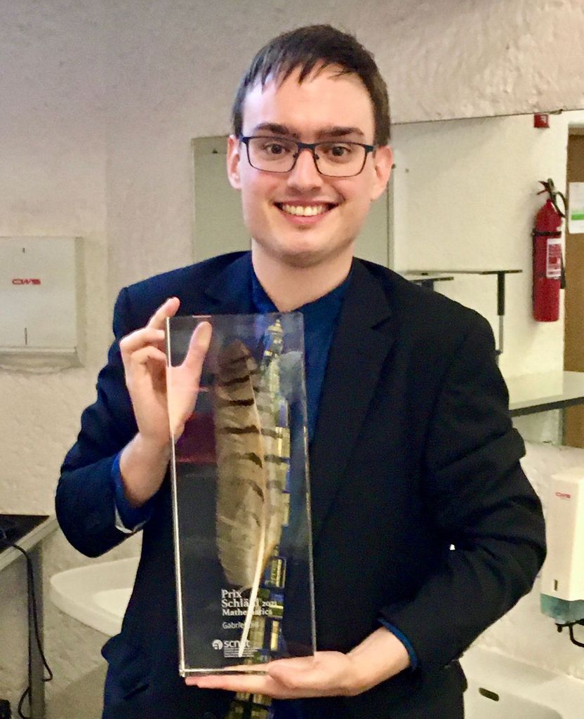Gabriel Dill on 15 September 2021 with his Prix Schläfli 2021 in Mathematics Gabriel Dill on 15 September 2021 with his Prix Schläfli 2021 in Mathematics